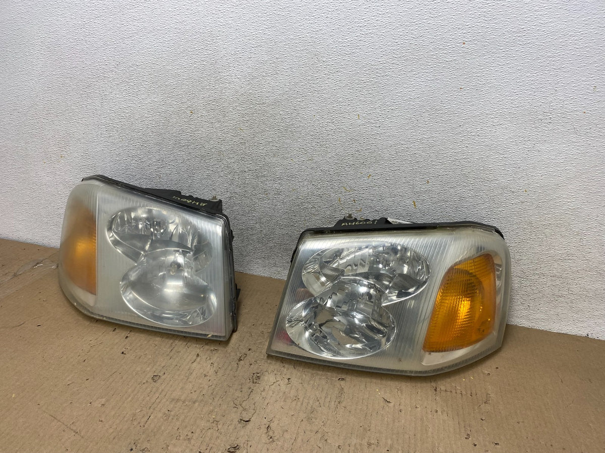 2002 to 2009 Gmc Envoy Left+Right Set Headlights Halogen AH6001 DW2