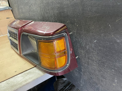 1985 1989 Plymouth Reliant Right Headlight Bezel W/Turn Signal Marker OEM L91331