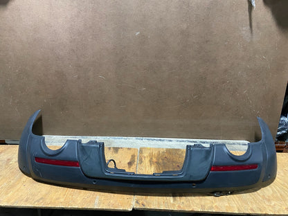 2011 to 2015 Ford Explorer Rear Bumper Cover With Parking Aid V7199 PS0