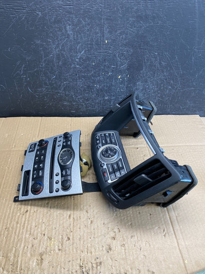 2007 to 2010 Infiniti G35 G37 Radio Player Climate Control Panel Bezel AC9602 DG2