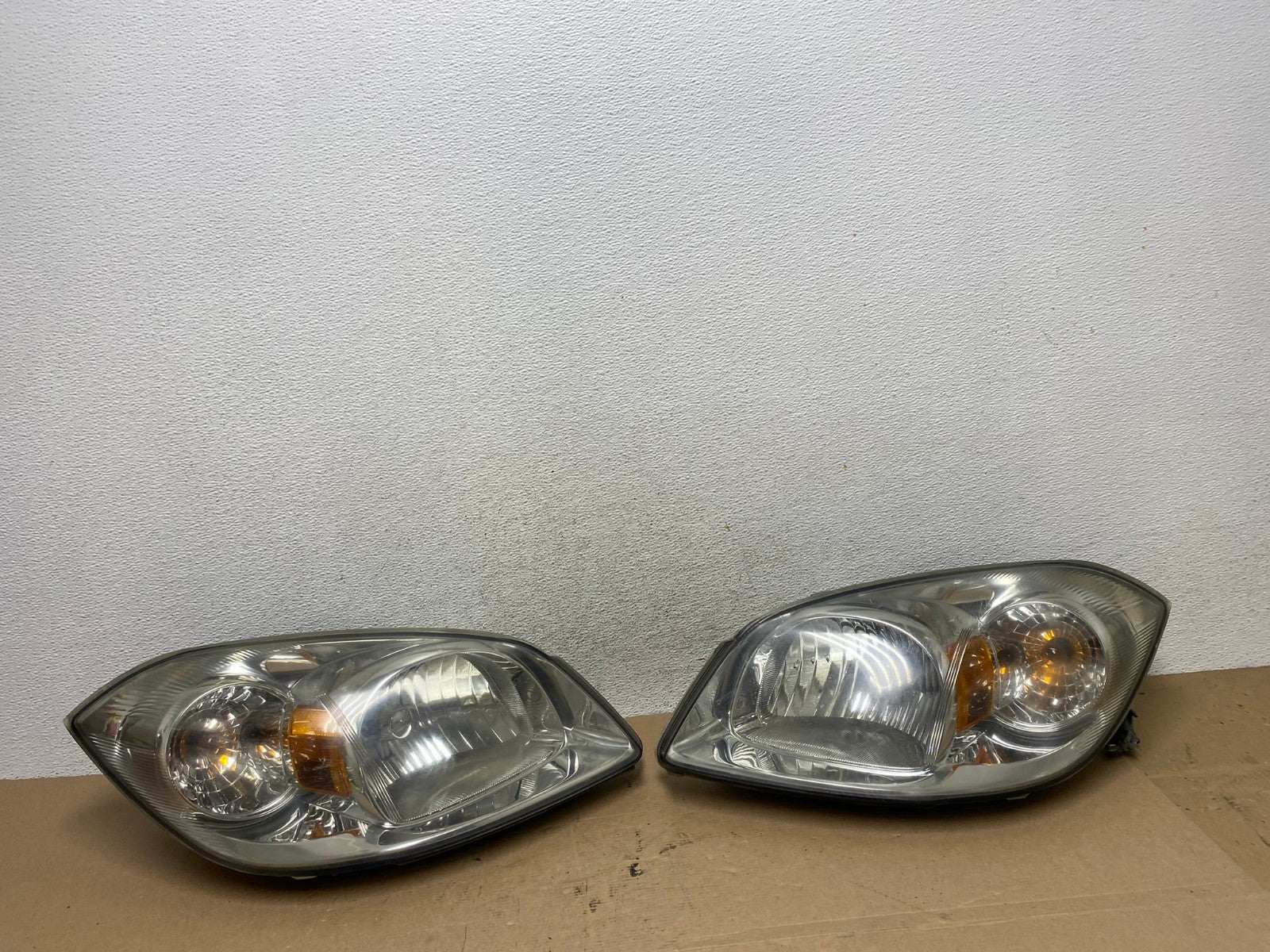 2005 - 2010 Chevrolet Cobalt Sedan Left+Right Headlights AF4422 LK0