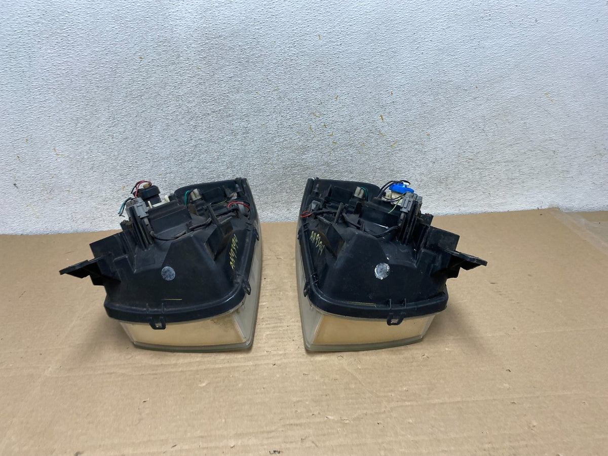 2001 to 2004 Nissan Frontier Left+Right Halogen Headlights AH9394 DW9