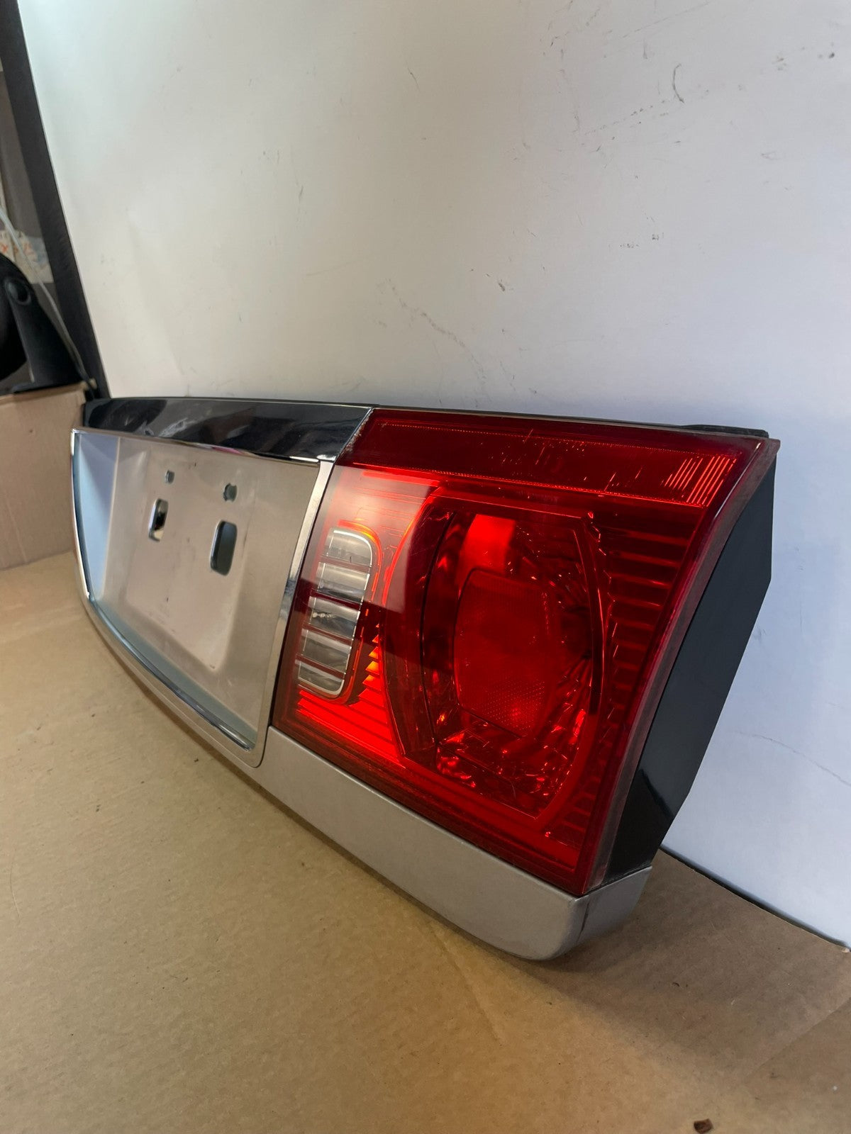 2003 to 2006 Kia Optima Rear License Plate Center Tail Light Panel AG3120 DG1