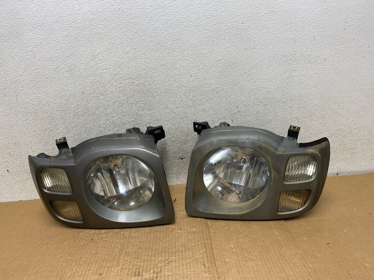 2002 2003 2004 Nissan Xterra Left+Right Side Headlights DEPO AI6519 DW0