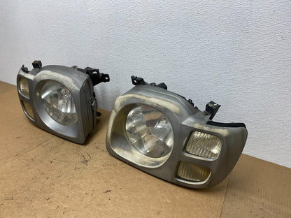 2002 2003 2004 Nissan Xterra Left+Right Side Headlights OEM AC3484 DW1