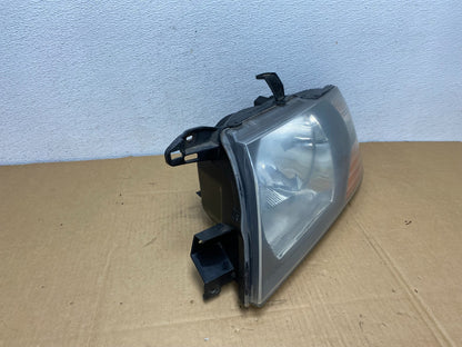 2000 to 2004 Mitsubishi Montero Pajero Left Driver LH Headlight AC7499 DW2