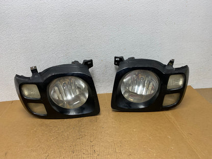 2002 2003 2004 Nissan Xterra Left+Right Side Headlights AE0510 DW0