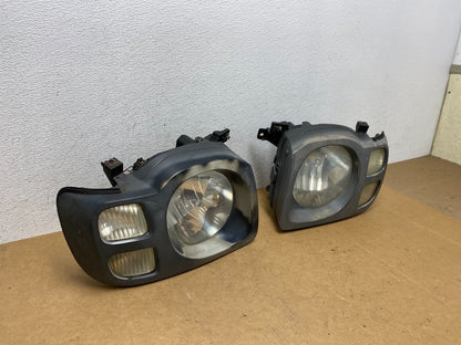 2002 2003 2004 Nissan Xterra Left+Right Side Headlights AE3089 DW2