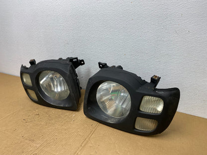 2002 2003 2004 Nissan Xterra Left+Right Side Headlights AC7618 DW1