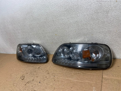 1997 to 2003 Ford F150 Left+Right Set Side Headlights Z3177 DG1