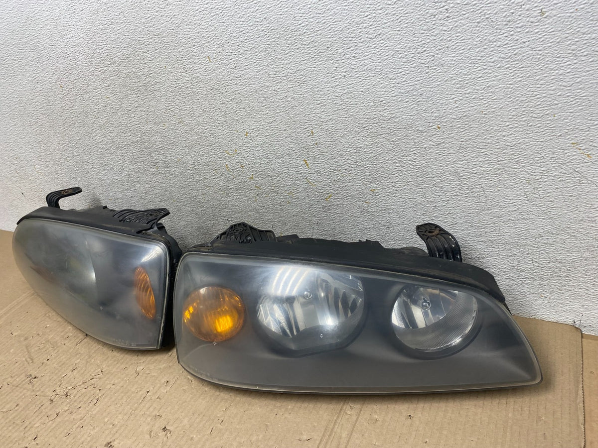 2004 2005 2006 Hyundai Elantra Left+Right Set Halogen Headlights AJ1820 LK2