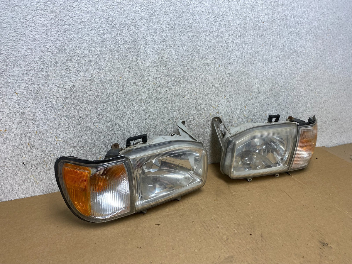 1999-2004 Nissan Pathfinder Left+Right Side Set Halogen Headlights AI2646 DW2