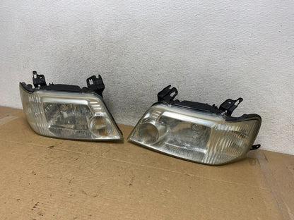2005 to 2007 Mercury Mariner Left+Right Side Halogen Headlights AH7925 DW2