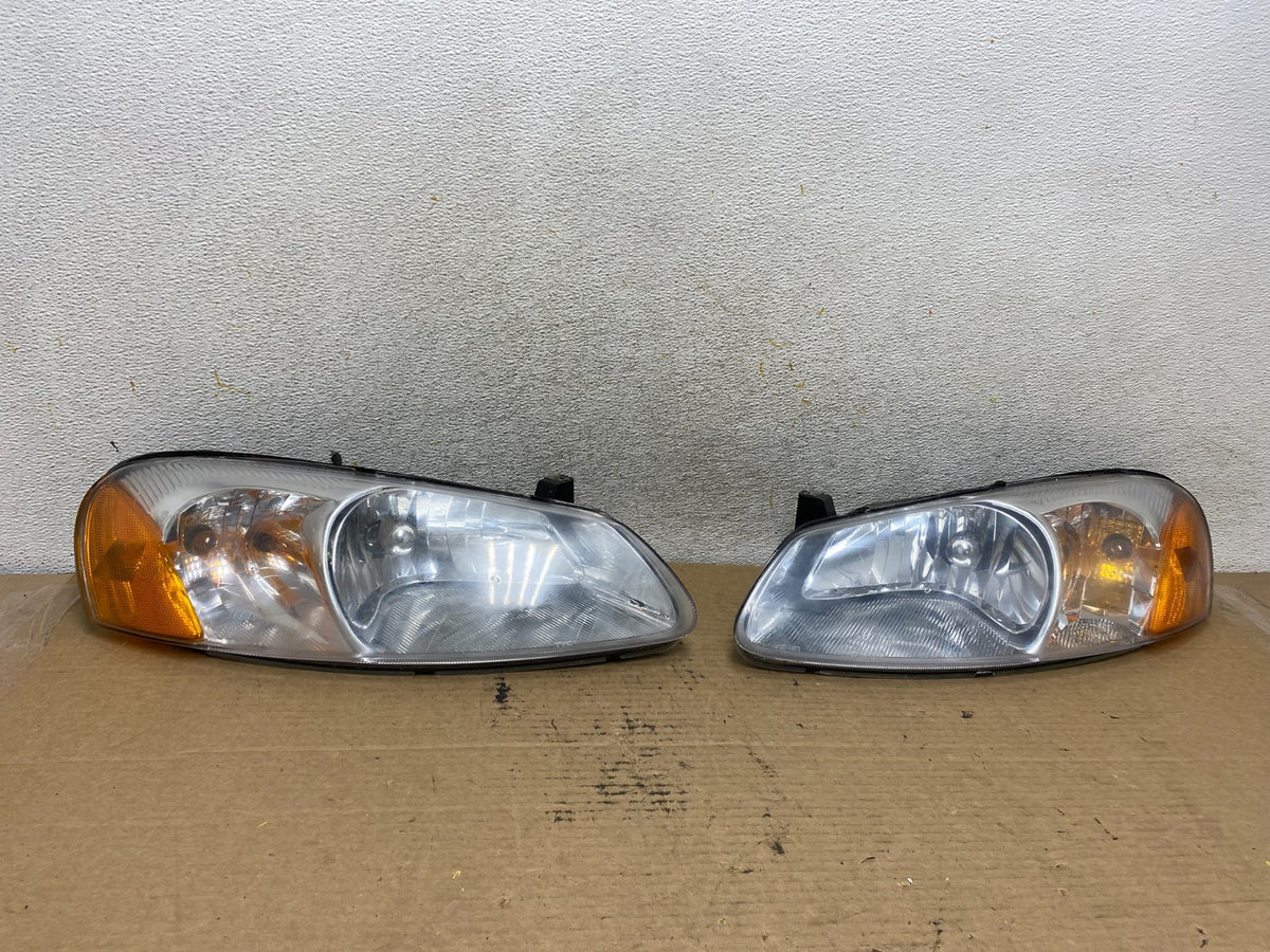 2001 to 2002 Chrysler Sebring Left+Right Set Headlight AH4141 DG0