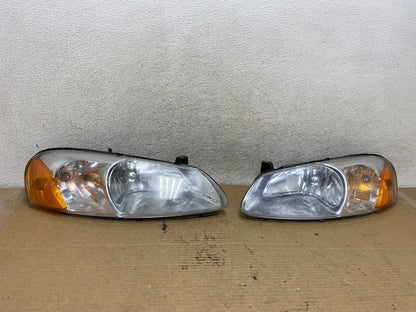 2001 to 2002 Chrysler Sebring Left+Right Set Headlight AH4141 DG0