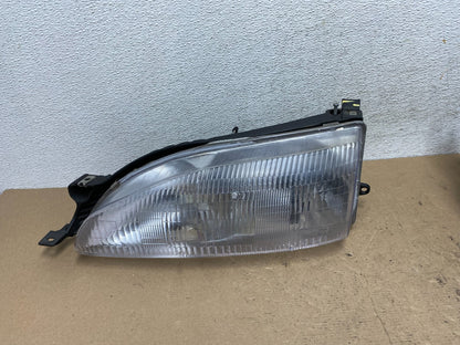 1995 to 1996 Toyota Camry Left Driver LH Side Headlight TYC AF4676 DW0
