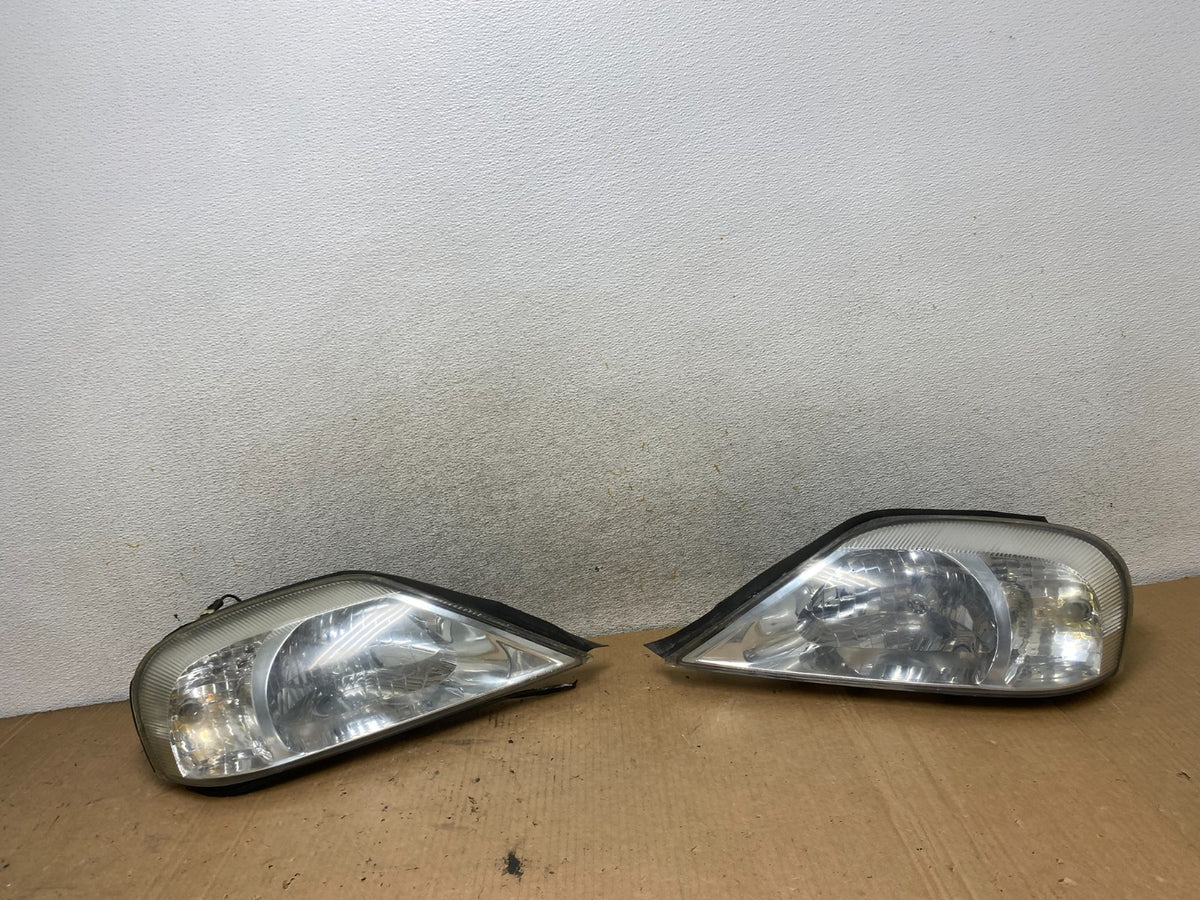 2000 to 2005 Mercury Sable Left+Right Side Halogen Headlights AI8874 DW0
