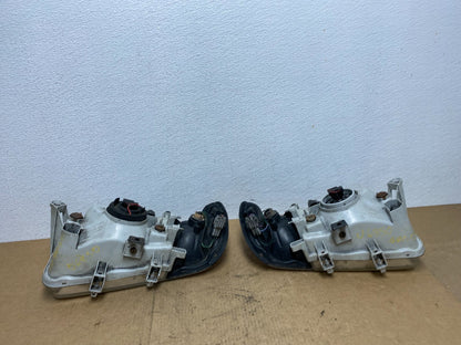 1999-2004 Nissan Pathfinder Left+Right Side Set Halogen Headlights Oem AC3404 DW7