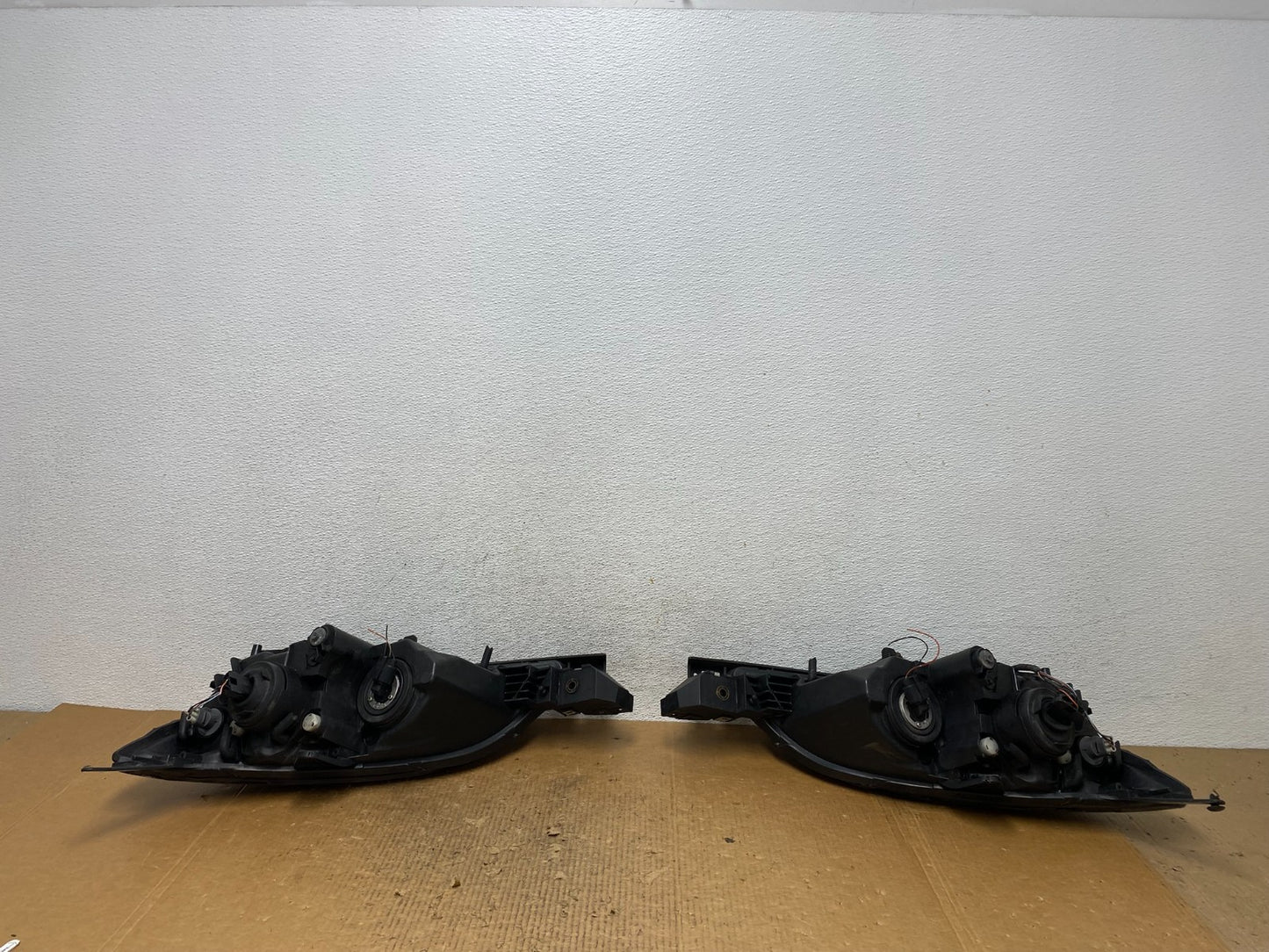 2004 to 2009 Mazda 3 Hatchback Left+Right Side Headlights AE2756 DW10