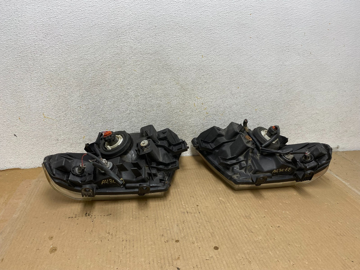 2005 2006 2007 Nissan Pathfinder Halogen Headlights Left+Right AH3068 DW7