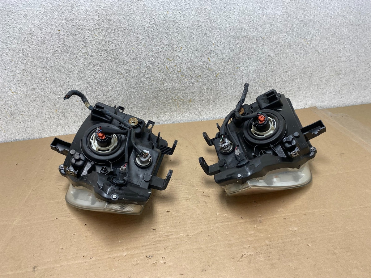 2008 to 2012 Nissan Pathfinder Halogen Headlights Left+Right AH9477 DW9
