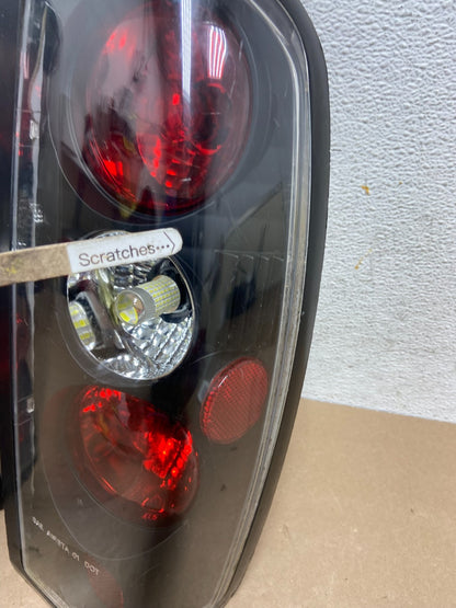 1998 to 2004 Nissan Frontier Left+Right Set Black Side Tail lights AE6773 DG4