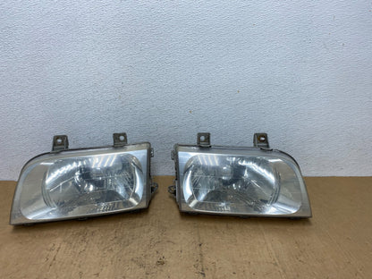 1998 to 2002 Kia Sportage Left+Right Halogen Headlights AD0635 DW0
