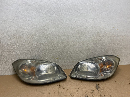 2005 - 2010 Chevrolet Cobalt Sedan Left+Right Headlights W3712 DW0
