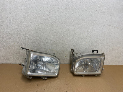 1999-2004 Nissan Pathfinder Left+Right Side Set Halogen Headlights P8186 DW0