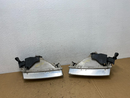 2000 to 2002 Mazda 626 Left+Right Side Headlights AD1087 DW9