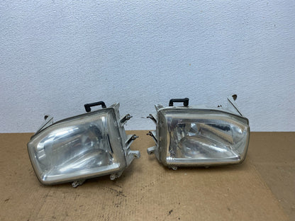 1999-2004 Nissan Pathfinder Left+Right Side Set Halogen Headlights Oem AC3303 DW0