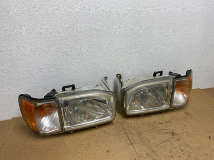 1999-2004 Nissan Pathfinder Left+Right Side Set Halogen Headlights Oem AC3405 DW2