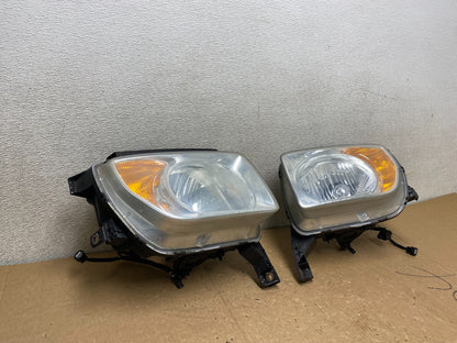 2003 to 2006 Honda Element Left+Right Side Headlights U9911 DW2