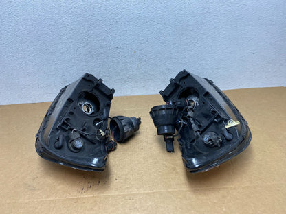 2000 to 2007 Ford Taurus Left+Right Side Halogen Headlights AD4624 DW8