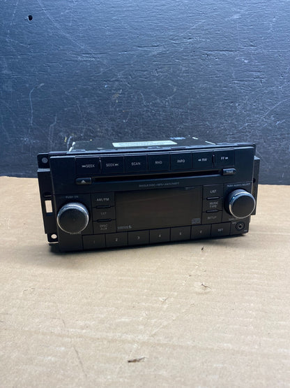 2007-2012 Chrysler Dodge Jeep Ram Radio CD MP3 AUX Receiver AD7605 DG0