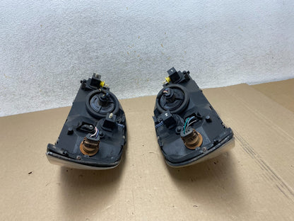 1999 to 2003 Ford Windstar Left+Right Halogen Headlights AJ1964 DW9