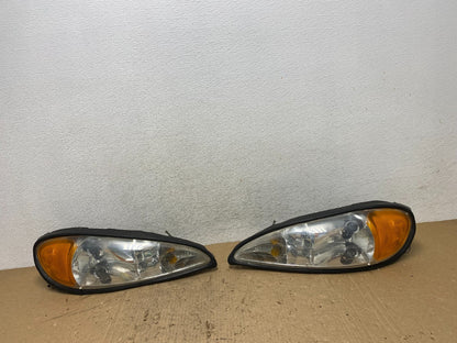 1999 to 2005 Pontiac Grand Am Left+Right Set Headlights AG1428 DW0