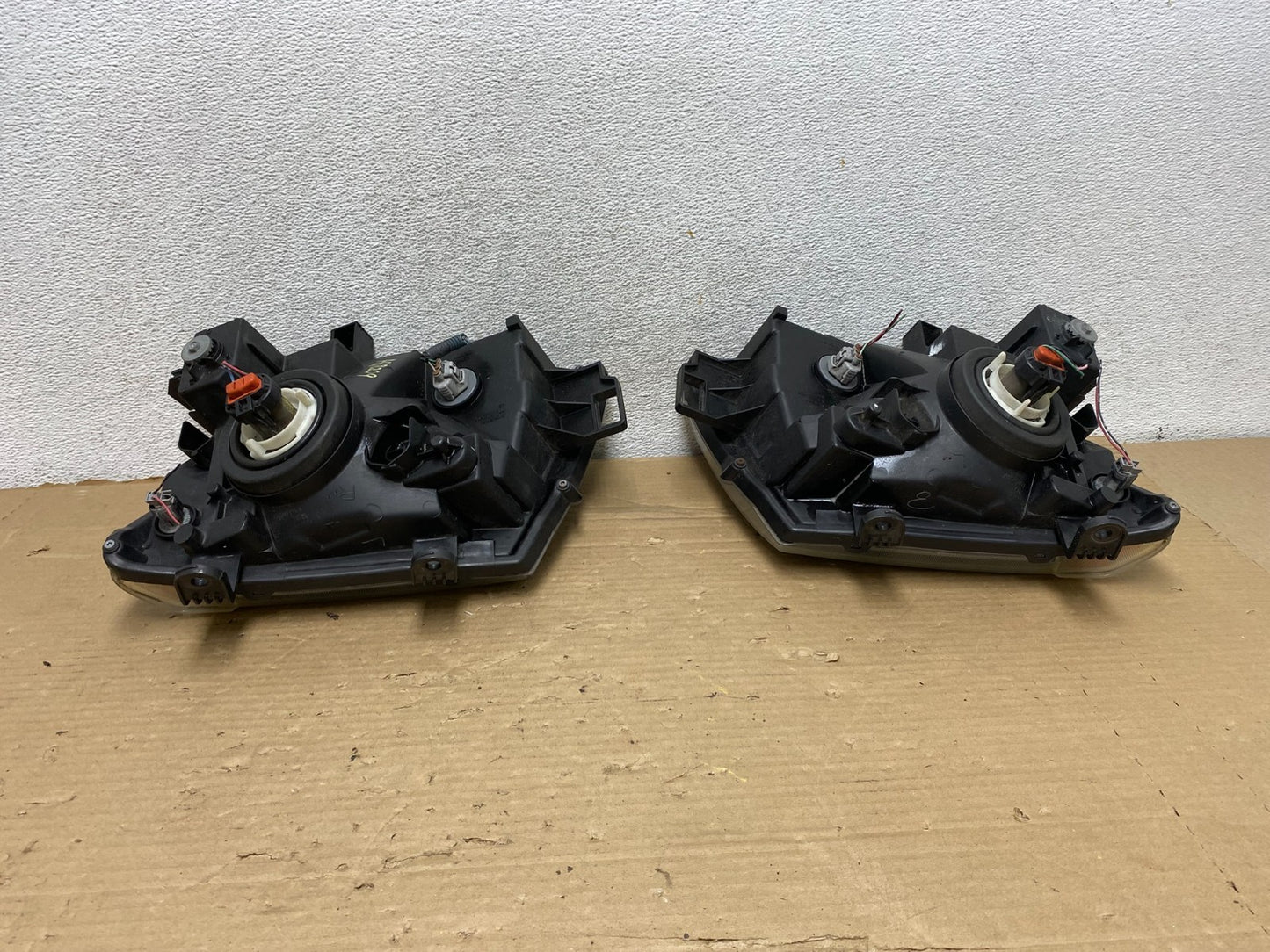 2005-2015 Nissan Xterra Driver Left+Right Side Set Headlights AG8209 DW7