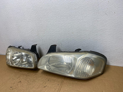 2000 to 2001 Nissan Maxima Left+Right Side Set Halogen Headlights AC7705 DW1