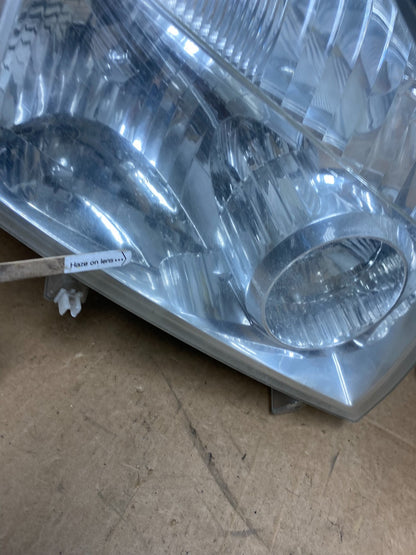 2004 to 2007 Nissan Armada Left+Right Side Set Headlights AD6132 DW7
