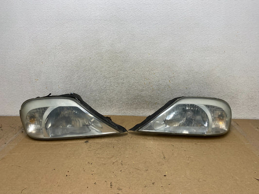 2000 to 2005 Mercury Sable Left+Right Side Halogen Headlights AH8092 DW0