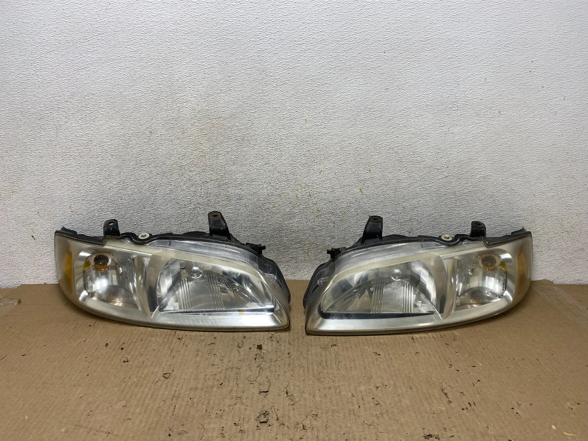 2000 to 2003 Nissan Sentra Front Left+Right Side Headlights AH6613 DW0