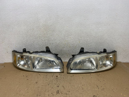 2000 to 2003 Nissan Sentra Front Left+Right Side Headlights AH6613 DW0