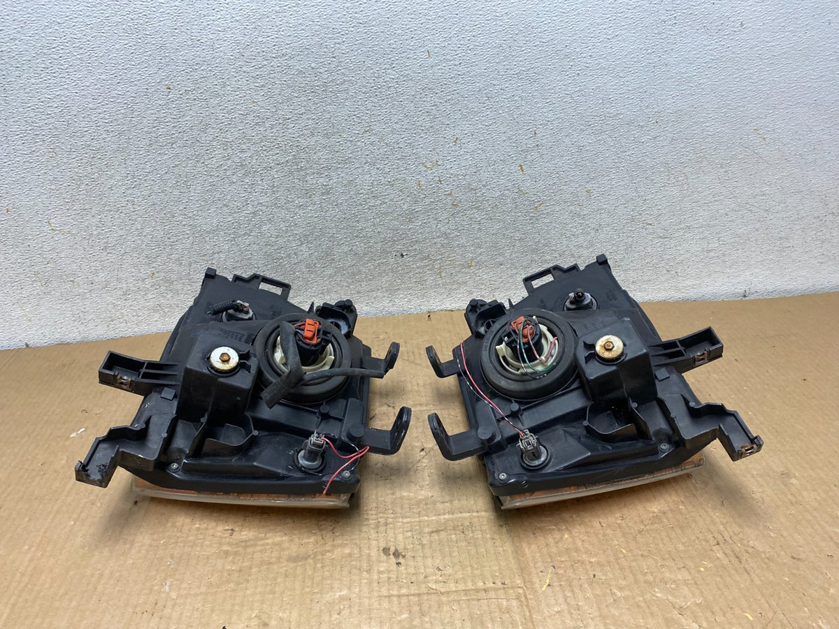 2005-2015 Nissan Xterra Driver Left+Right Side Set Headlights AI8164 DW7