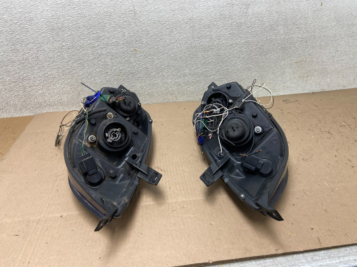 2006 - 2007 Mitsubishi Eclipse Left+Right Side Halogen Headlights AA0389 DW9