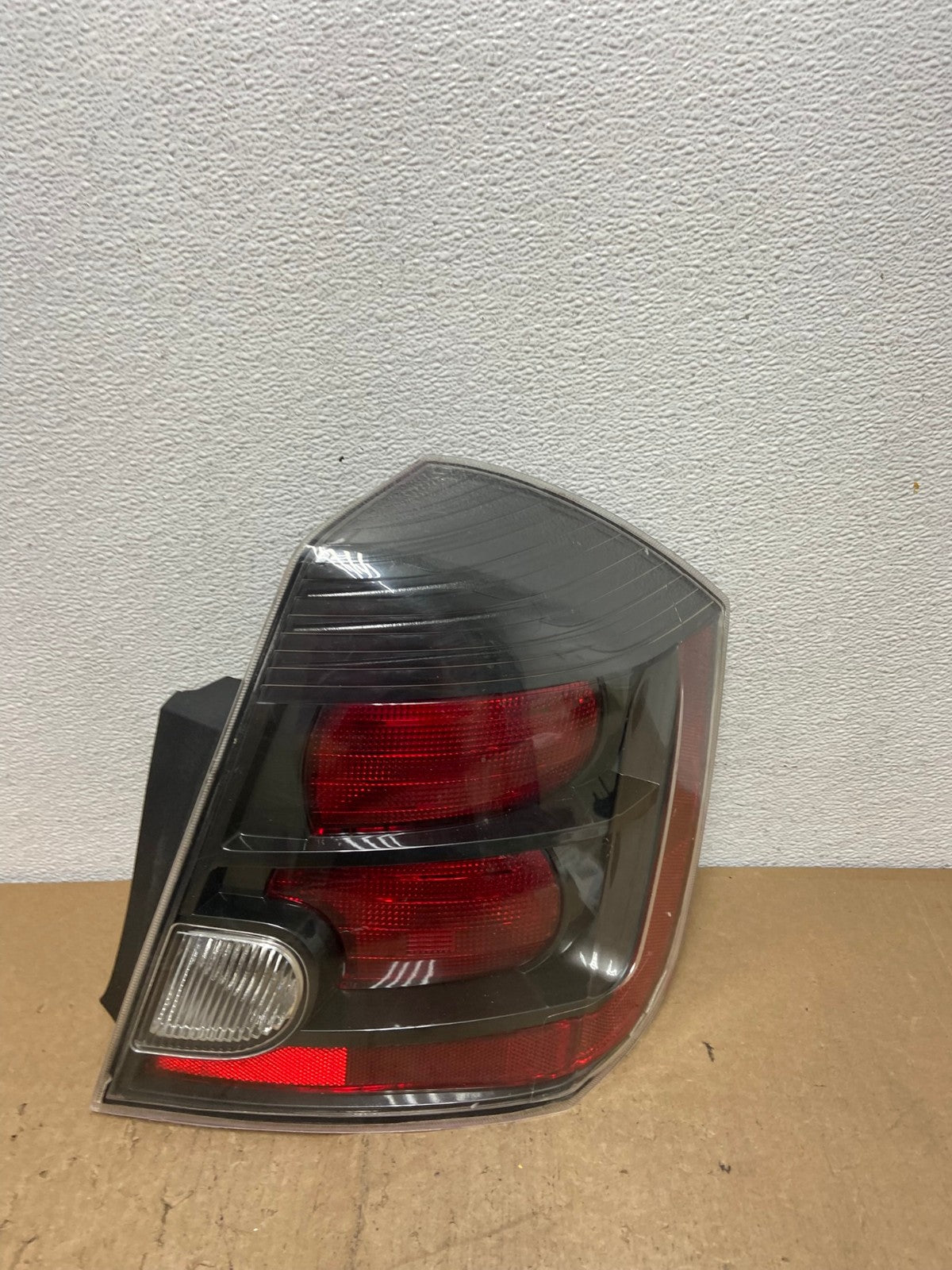 2007 to 2012 Nissan Sentra Right Passenger Rh Black Tail Light DEPO AC7295 LK0