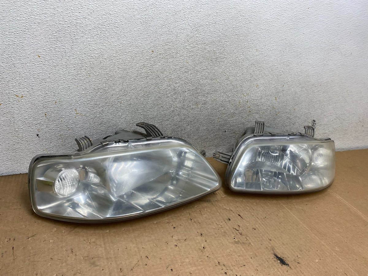 2004 - 2006 Chevrolet Aveo Hatchback Left+Right Headlights Halogen AI8872 DW2