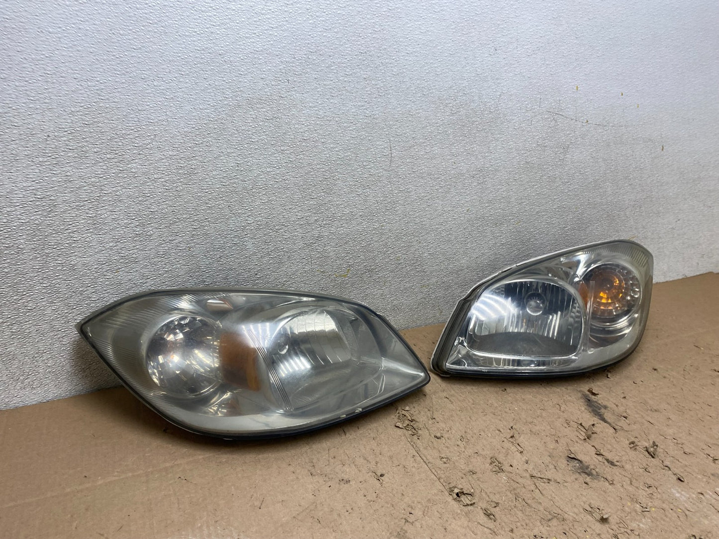 2005 - 2010 Chevrolet Cobalt Sedan Left+Right Headlights W3712 DW2