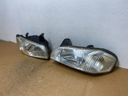 2000 to 2001 Nissan Maxima Left+Right Side Set Halogen Headlights AE1630 DW1