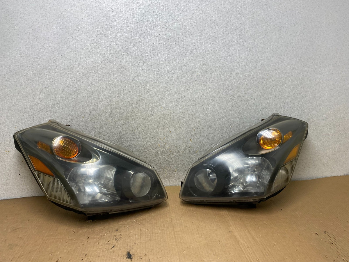 2004 to 2009 Nissan Quest Left+Right Black Headlights AI8985 DW0